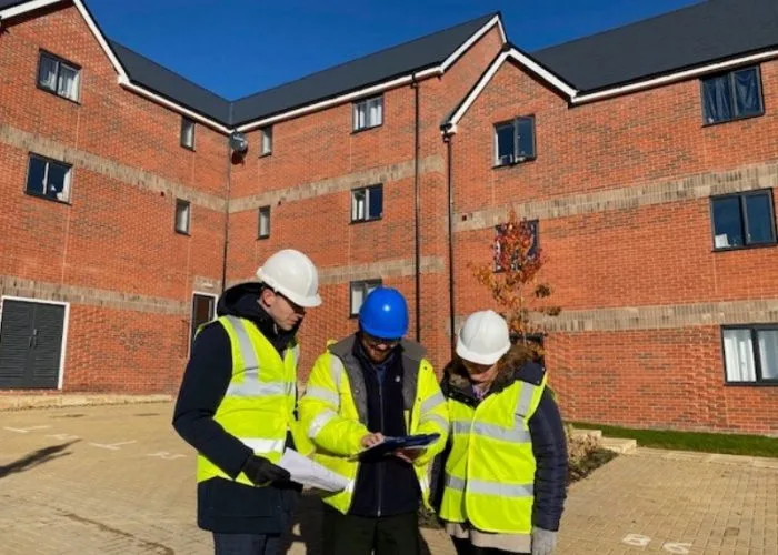 Three planning officers on new build site